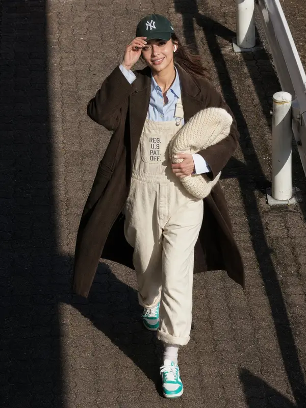 Ultra-realistic candid street-style fashion photo of a young woman captured… — GPT Image 2 prompt by @AiwithLariab