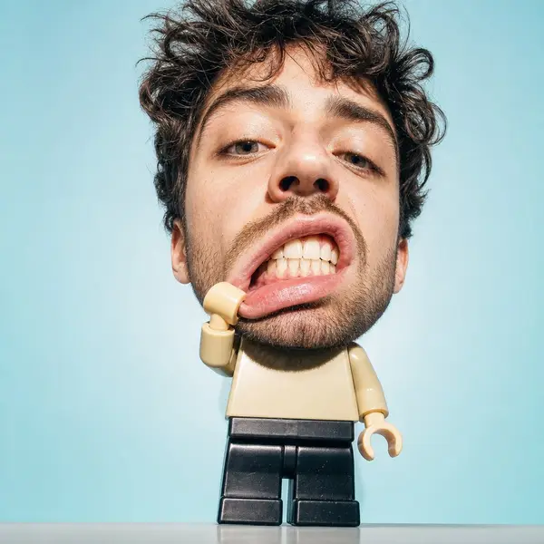 Create a surreal studio portrait of a man from an attached photo with a… — GPT Image 2 prompt by @im_shahid7