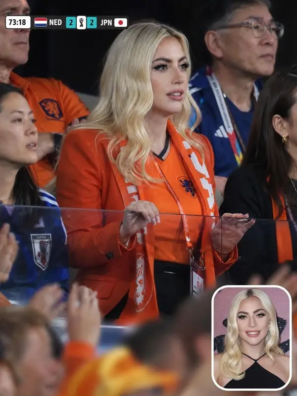 A photorealistic stadium crowd scene featuring a stylish blonde woman wearing… — GPT Image 2 prompt by @Kashberg_0