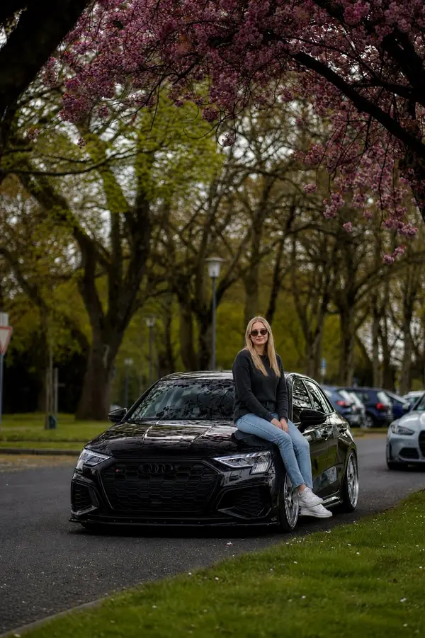 Ultra-realistic automotive lifestyle photography of a stylish young woman… — AI Model prompt by @oju689