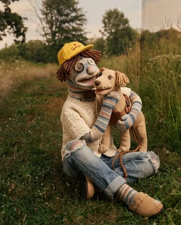 Recreate the uploaded photo with a scene with handmade sock dolls. Keep the… — Nano Banana prompt by @im_shahid7