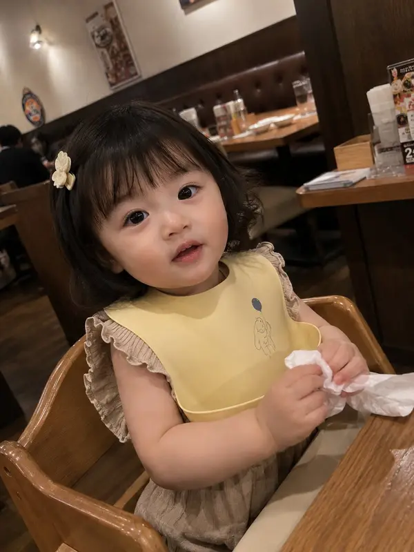 Photorealistic candid smartphone snapshot of an adorable toddler girl sitting… — GPT Image 2 prompt by @saniaspeaks_