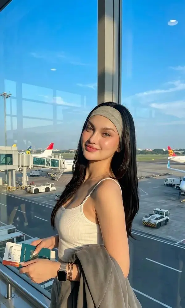 Create an ultra-realistic high-fashion travel editorial photographed inside… — Nano Banana 2 prompt by @kingofdairyque