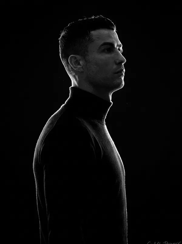 A stark, high-contrast, black-and-white (monochromatic) side-profile portrait… — GPT Image 2 prompt by @Kashberg_0