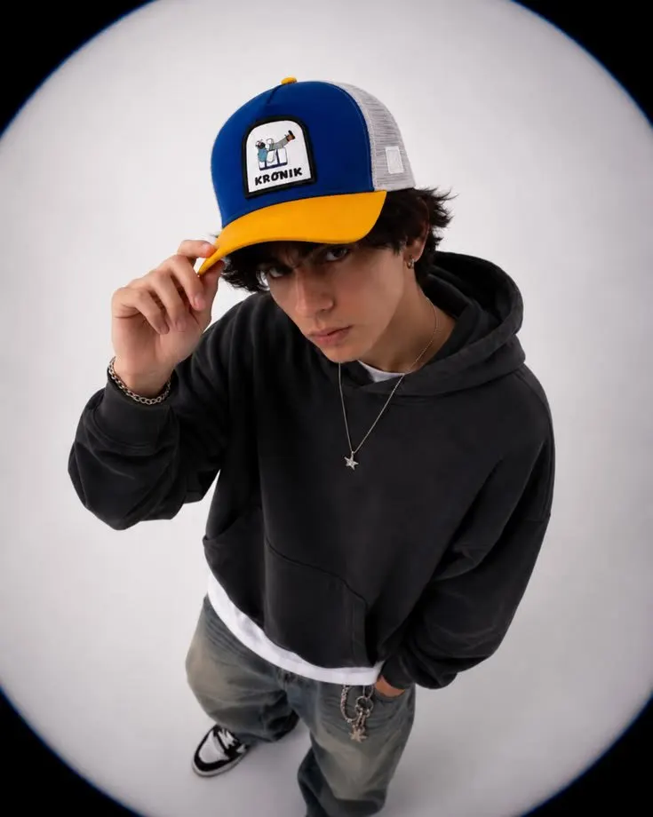 Ultra realistic high fashion streetwear portrait of a young man photographed in… — GPT Image 2 prompt by @harboriis