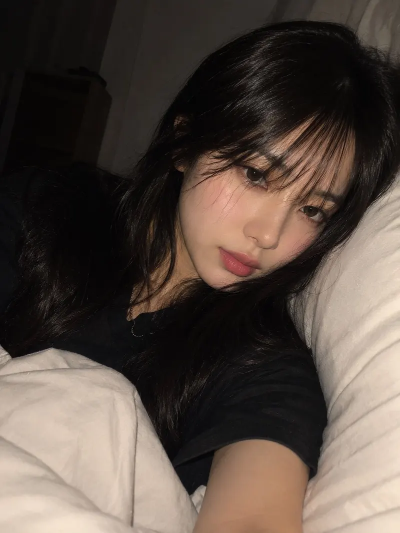 A highly realistic, intimate nighttime bedroom selfie of a young adult East… — Seedream prompt by @Naiknelofar788