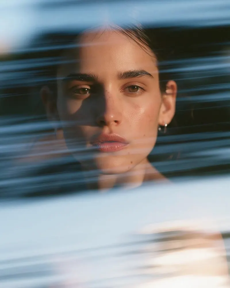 Ultra-realistic cinematic close-up portrait of a beautiful young woman with… — GPT Image 2 prompt by @Taaruk_