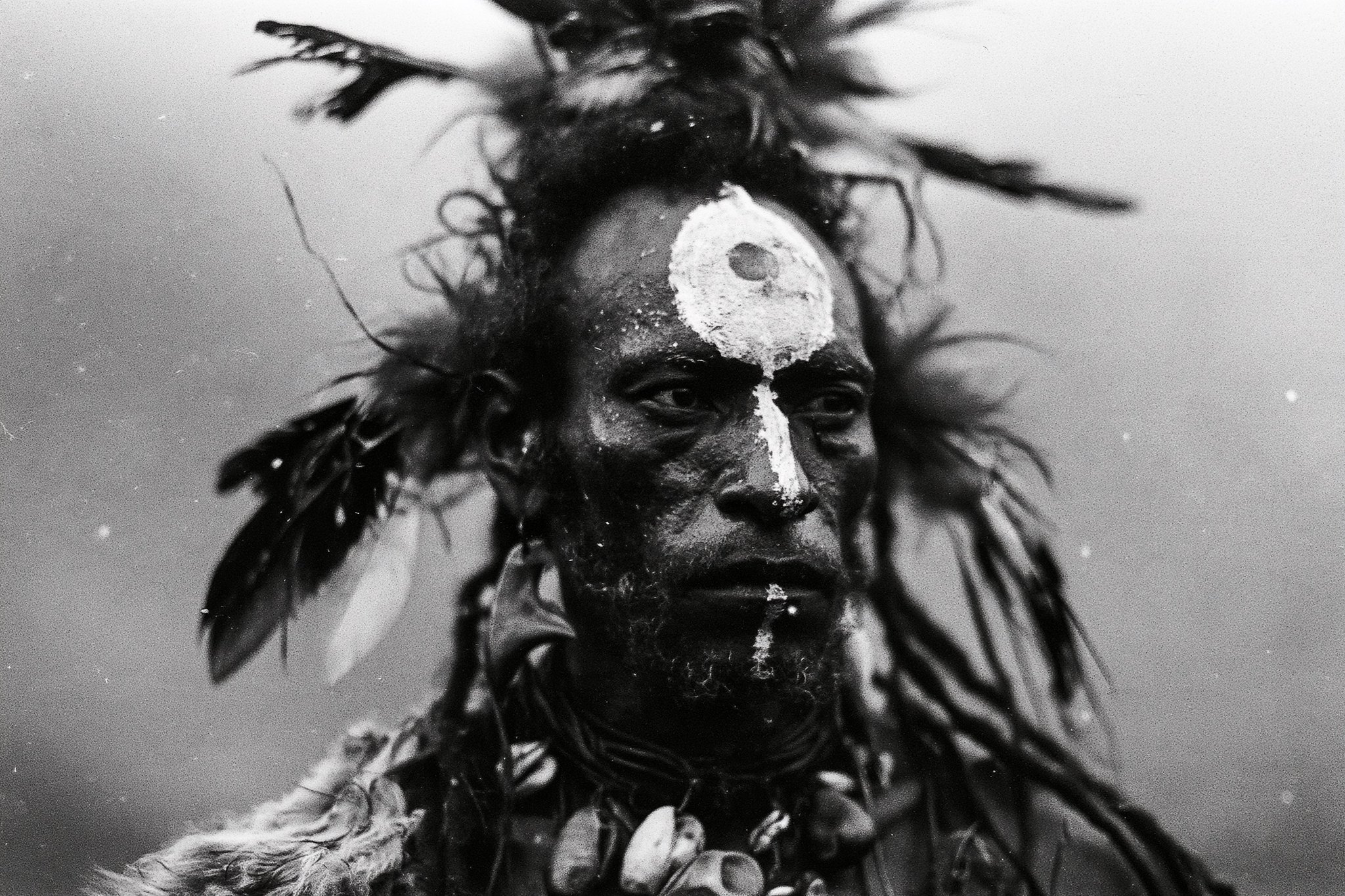 Asmat chief with white tribal face paint, wearing buffalo and deerskin… — AI-generated image by @michaelrabone using Midjourney